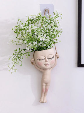 Jarrón creativo decorativo de muñeca gimnasta.